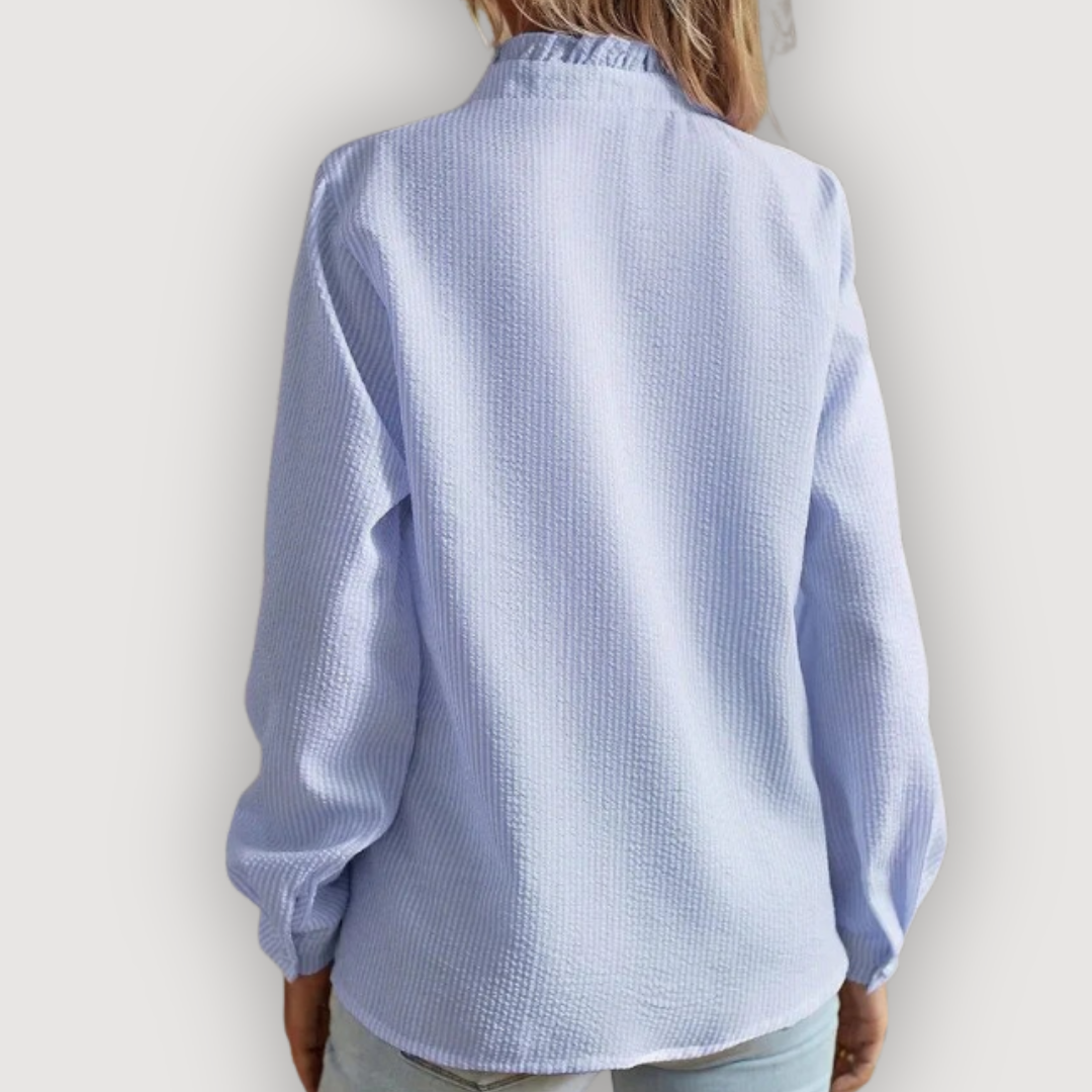 CLARA – BLUSA CON VOLANTES