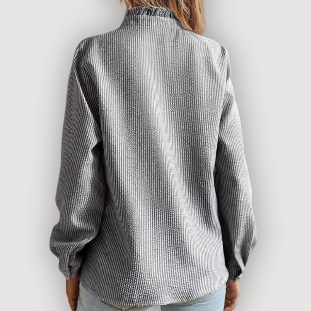 CLARA – BLUSA CON VOLANTES