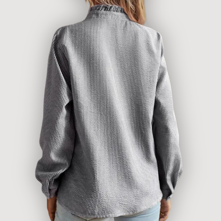 CLARA – BLUSA CON VOLANTES