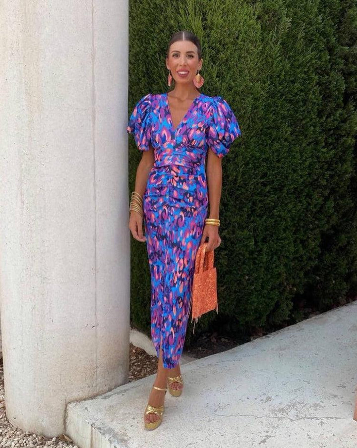 Loren - Vestido midi vibrante con mangas abullonadas