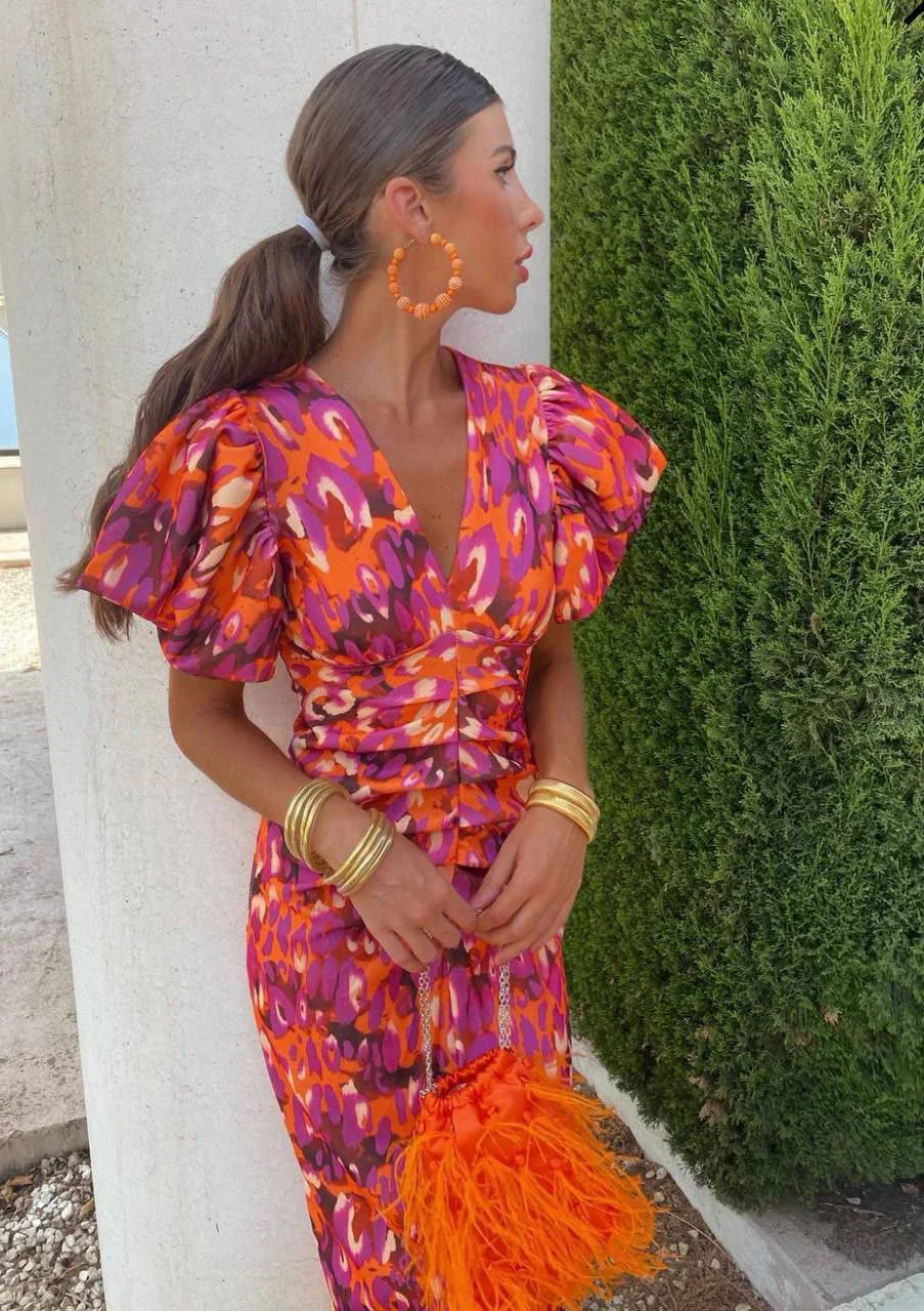 Loren - Vestido midi vibrante con mangas abullonadas